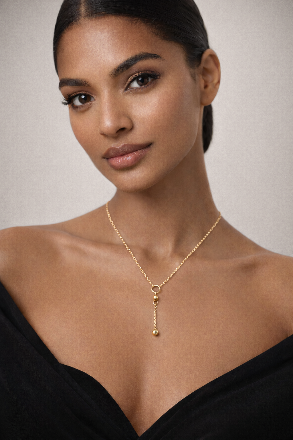 JOET Solis 18K gold necklace on elegant model