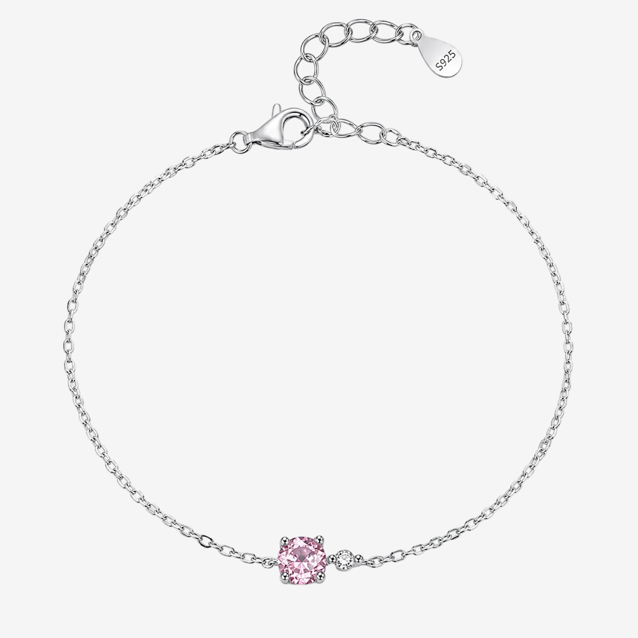 A JOET delicate sterling silver chain bracelet with a single pink gemstone accent, displayed on a clean white background. The bracelet features a lobster clasp, an adjustable extender chain with a '925' silver hallmark tag, and a small pavé setting holding the pink stone.